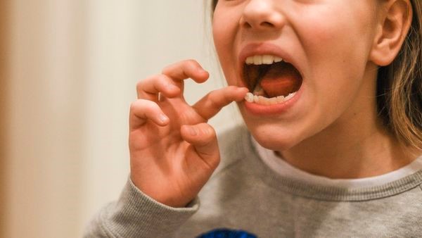 روش‌های درمان دندان لق شده